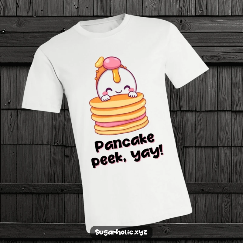 Funny t-shirt with a happy candy character peeking out from behind a delicious stack of fluffy pancakes.